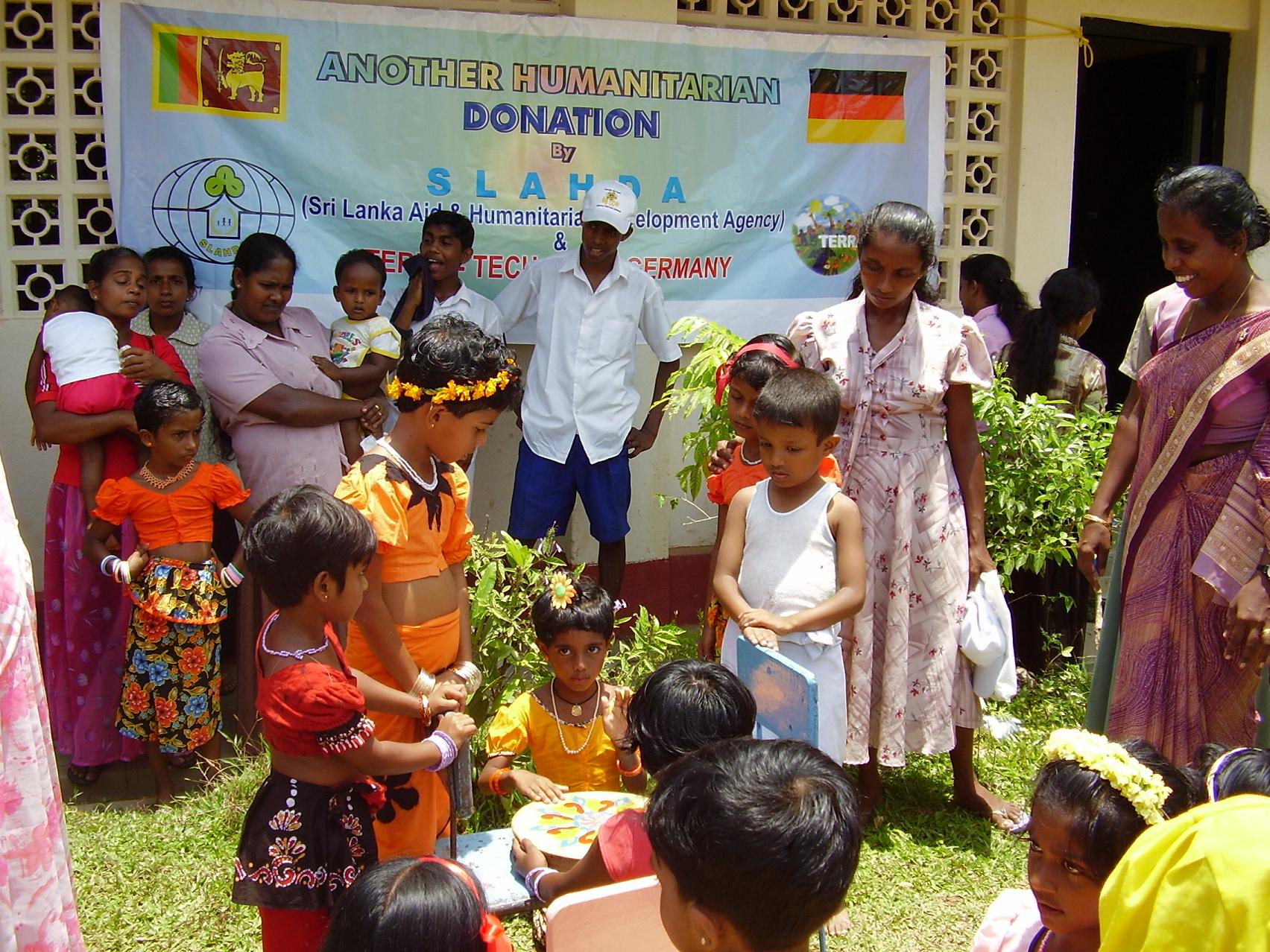 Children and families during the clothing donation programme
